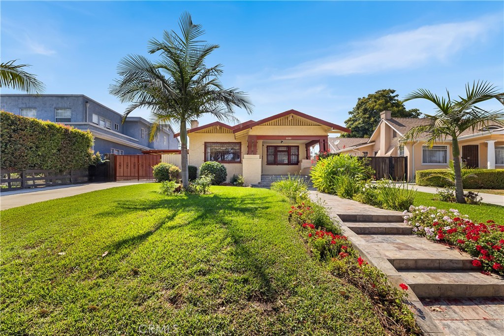 Welcome to this charming 3-bedroom residence offering 1,430 sq. ft. of comfortable living on a generous 7,002 sq. ft. lot in the prestigious Park Mesa Heights area in the heart of Los Angeles. Designed with versatility in mind, the home features multiple living spaces including a den, bonus room, and basement—perfect for work, play, or storage. Inside, the living room sets a warm tone with a classic fireplace and new laminate flooring that flows throughout the main living areas. The remodeled kitchen is a highlight, showcasing sleek quartz counters, modern cabinetry, and plenty of prep space for everyday cooking or entertaining. Ceiling fans add a touch of comfort, while the walk-in closet and dedicated laundry room enhance functionality. Unique amenities include a private sauna, offering a relaxing retreat at home. All three bedrooms are well-proportioned, with the primary bathroom designed for everyday convenience. The property’s expansive backyard provides endless opportunities for outdoor enjoyment—whether hosting gatherings, gardening, or planning future additions. A detached garage with a newly poured slab and new garage door adds storage and potential for an ADU (buyer to verify). The driveway provides ample parking for up to 6 cars. Located in a central neighborhood near local parks, shops, dining, and public transit—including access to the Crenshaw/Expo Line—this home balances comfort, character, and convenience with room to grow.