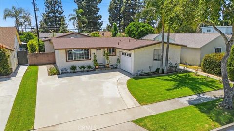 Photo of 9546 Cecilia St, Downey, CA 90241 (MLS # DW26086128)