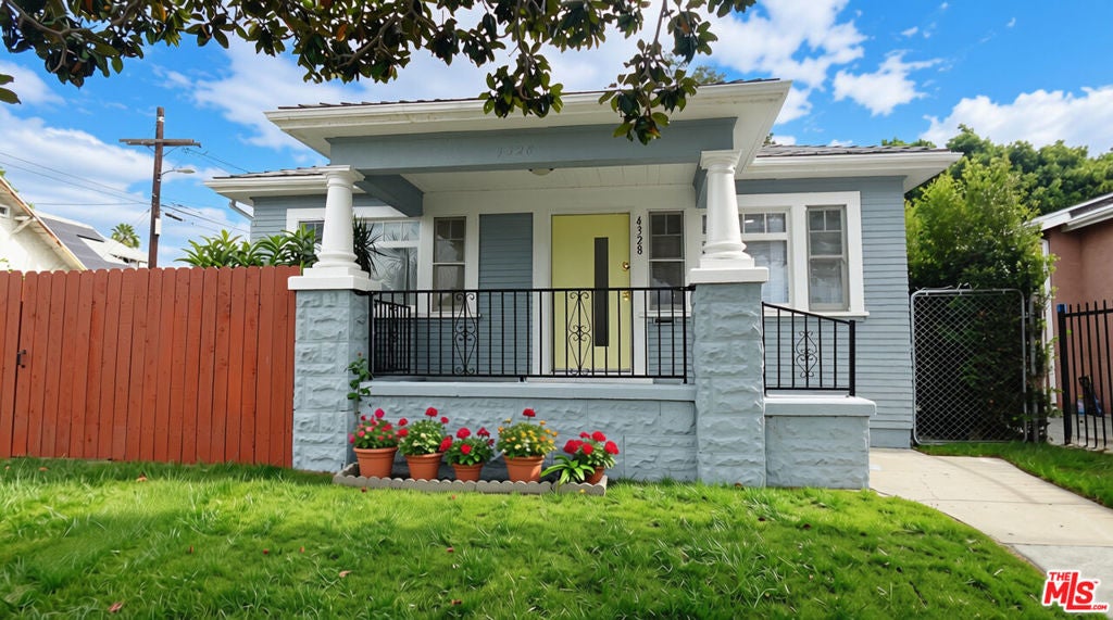 Photo of 4328 Brighton Avenue, Los Angeles, CA 90062 (MLS # 26103877)