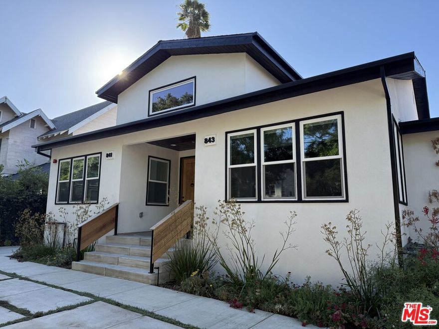 NEWLY BUILT MODERN ON LA FAYETTE PARK PLACE | SILVER LAKE Perched above Sunset on one of Silver Lake's most desirable tree-lined streets, this newly built 2-bedroom, 2-bath residence offers the perfect balance of tranquil neighborhood living and walkable urban convenience, just one block from Sunset's restaurants and nightlife. Inside, thoughtfully designed spaces showcase an abundance of natural light throughout the open-concept layout. The modern kitchen anchors the living area with a quartz island, custom cabinetry, and stainless steel appliances that inspire home cooking. A gas fireplace adds warmth and ambiance to the living space, creating the perfect focal point for relaxed evenings at home. Clean lines, warm wood-tone flooring, and quality finishes throughout reflect meticulous attention to detail. Both bedrooms offer comfortable proportions with ample closet space. Two full bathrooms feature contemporary fixtures and finishes. In-unit laundry, tankless water heater, central air with smart thermostats, and secure automatic gates handle the practical side of modern living. Outside, native landscaping maintained by a master gardener adds authentic California character to this professionally managed property. The real draw: La Fayette Park Place is that rare Silver Lake street. It's wide, quiet, genuinely neighborly where you can walk to Tacolina for margaritas on Taco Tuesday, grab a morning caf con leche at Cafe Tropical, or loop the reservoir for your daily run, all without the chaos of Sunset at your doorstep. The best of Silver Lake is your neighborhood, not your commute. Quality construction in the right location at a fair price. A rare find in today's Silver Lake. Move-in ready option: Designer furnishing packages available, including fully equipped move-in ready options.