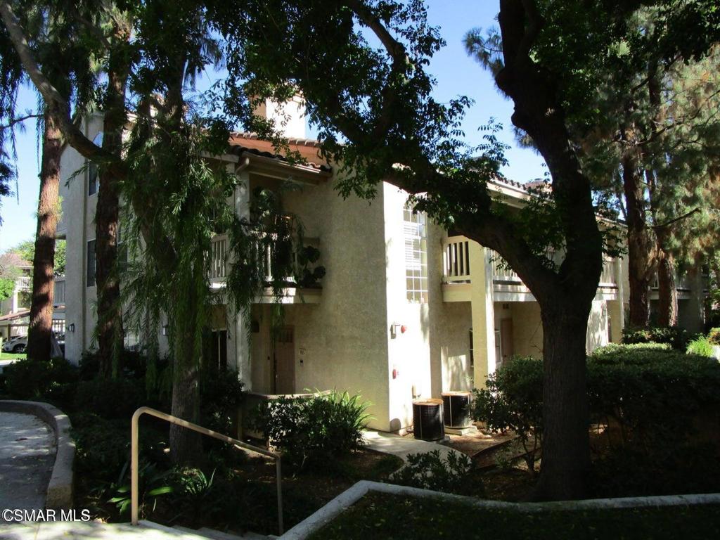 Welcome to this beautiful 2 Bedroom + 2.5 bathroom, 2 story end-unit townhome located in Shadow Ridge, one of the most desirable communities in Oak Park. 1 car garage + 1 covered parking spot. Enjoy 'resort living' with nearby amenities that include community pools and spa, saunas, fitness center, tennis courts, racquetball courts, bicycle, jogging and hiking trails, recreation room, basketball and volleyball courts, picnic areas, dog park, award winning schools and more!This lovely unit features nice wood-like laminate flooring throughout, fresh paint, a newer A/C unit, modern kitchen and bathroom upgrades and washer and dryer.The updated kitchen features granite countertops, stainless steel appliances and breakfast bar. The inviting living room includes a fireplace and sliding doors that open to the front patio space. Upstairs you will find two primary suites with walk-in closets, upgraded ensuite bathrooms and private balconies. Pet friendly. Hurry! You will absolutely love this home... check it out today!