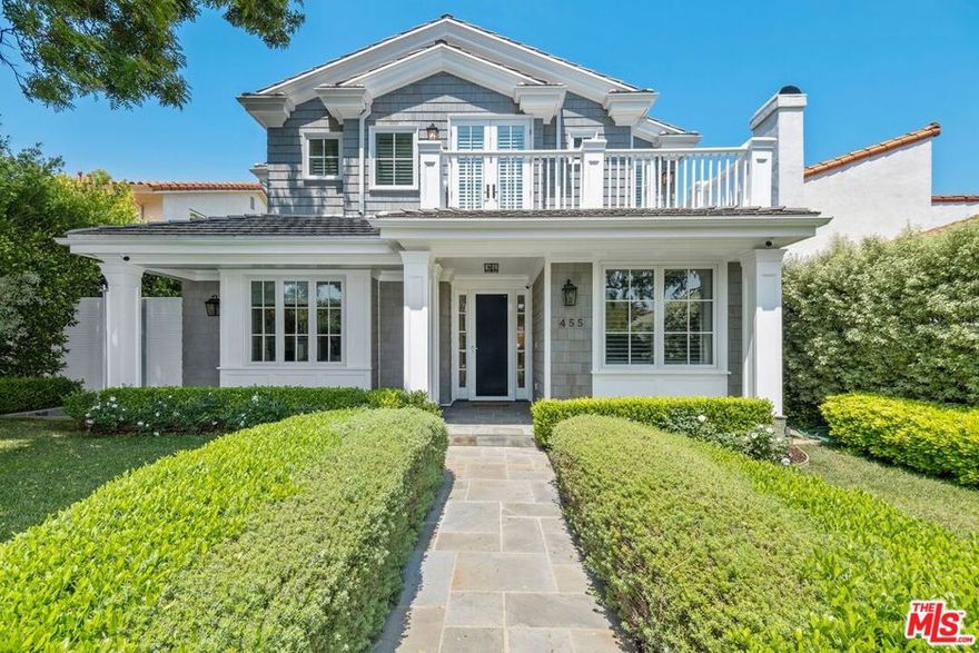 Pristine and perfectly designed Traditional home reminiscent of a Hamptons-style estate in the highly coveted north-of-Montana area of Santa Monica. Bright and light with contemporary lines and an ideal floor plan. Crafted with the very finest of materials, no detail is overlooked from the perfect French oak floors throughout to the extensive paneling and coffered and tongue and groove ceilings. Every luxurious amenity a private home could desire is provided including six bedroom suites, a library/home office, a formal living room with a fireplace and large open dining room, a wall of folding doors that slide open to provide indoor/outdoor living from the Family room to the rear yard, a trellis-covered blue stone patio, an outdoor fireplace, a pool with a connected spa and custom made electric pool cover, built-in high-end Lynx BBQ grill station, gourmet cooks kitchen with marble counters and island with Wolf appliances, basement with large private home theater, temperature controlled wine cellar, gym, sauna, guest bedroom with an en-suite bath, laundry hookup, and large additional lower level family room with bar. A stunning primary suite with terrace, fireplace, custom built-ins, large furniture grade walk-in closet with marble counter island, and spa-like bathroom with soaking tub, steam shower, and dual toilet rooms with Toto Washlets.  Upstairs laundry room and three additional bedrooms all with en-suite bathrooms and a second upstairs balcony facing the front yard. Privacy and security are intact with perfectly grown and manicured hedges and top-of-the-line custom gates surrounding the property from Mulholland brand.  Detached garage 2 car S x S garage with Tesla Electric vehicle charger!  Close to both the Brentwood Country Mart and Montana Avenue with world class shopping, restaurants and grocery stores.