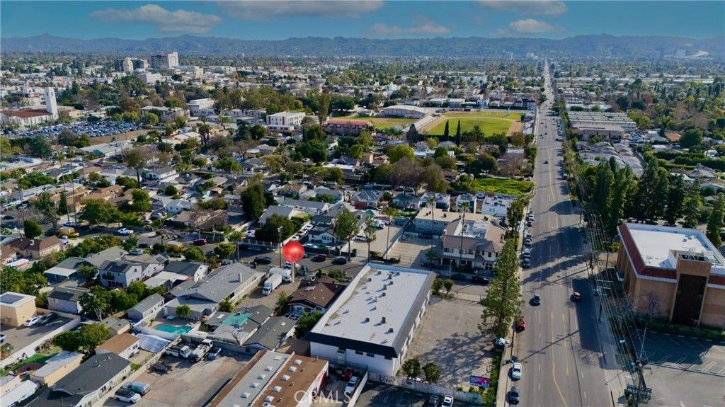 Photo of 14841 Archwood, Van Nuys, CA 91405 (MLS # SR26026433)