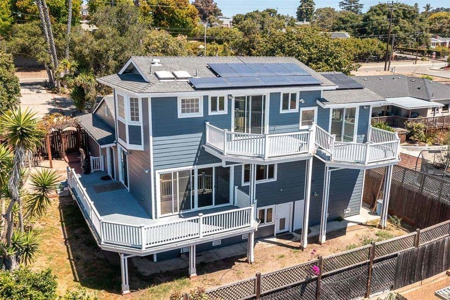 Full ocean views! Prime Grover Beach location just 1.8 miles from the sand. 3,074 sq. ft. of elevated coastal living with 4 bedrooms and 3 bathrooms. Every detail is designed to impress: a chef’s kitchen with granite counters, alder cabinetry, stainless steel appliances, powered island with second sink, wine fridge, walk-in pantry, and indoor built-in BBQ, all flowing into bright, open living spaces with Brazilian Koa hardwood floors, natural stone accents, and sustainable wood finishes. Recessed lighting throughout the home highlights every space, while a separate laundry room just off the kitchen adds convenience. An oversized finished basement with recessed lighting opens up limitless potential for a home office, game room, gym, or personal wine cellar. Entertain effortlessly in the media room with a 120” powered screen, projector, and surround sound or relax while enjoying stunning ocean views from the game room. The primary suite is a private retreat with a fireplace, ocean-view windows, skylit walk-in closet, and spa style bath with dual sinks, jacuzzi tub, and glass block shower. Modern upgrades make life seamless with full solar power featuring two Tesla batteries, updated plumbing throughout, new interior and exterior paint, high-end power blinds, and a whole-house water filtration system.

Outdoors, a brick patio, RV parking, and south-facing decks provide unobstructed ocean views while R2 zoning offers potential for a second home, ADU, or vacation rental income. All this, just minutes from the beach, shopping, parks, hiking trails, and easy access to 101. Don’t miss the opportunity to live the ultimate Grover Beach coastal lifestyle. Your perfect home is ready and waiting!