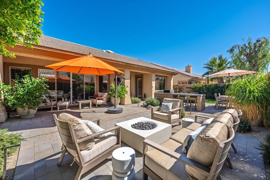 Step into desert living at its best with this stunning Monaco floor plan in highly desirable Sun City Palm Desert. This move-in-ready home offers 3 bedrooms, 3 bathrooms, and approximately 2,515sf of beautifully updated living space. The light-filled open layout features elegant finishes throughout, including remodeled interiors that blend comfort and sophistication. The chef's kitchen opens seamlessly to the family room and casual dining area--perfect for entertaining. The spacious primary suite offers a spa-like bath and ample closet space, while two guest rooms provide flexibility for visitors and/or a home office. Outdoors, enjoy a true resort-style setting with a south-facing backyard designed for relaxation and entertaining. Multiple paver finished seating and dining areas--one elevated with a private shade tree-- all surrounded by lush landscaping and a built-in barbecue for alfresco gatherings. The oversized laundry room provides tons of storage as does the 2-car + golf cart garage. Located within the gates of Sun City Palm Desert, residents enjoy world-class amenities including golf courses, pickleball, tennis, fitness centers, pools, restaurants, and endless social clubs--all with remarkably low HOA dues. Plus, a bonus is the low-cost electricity from Imperial Irrigation District (IID). A beautifully remodeled, move-in ready opportunity in one of the desert's most sought-after active adult communities!