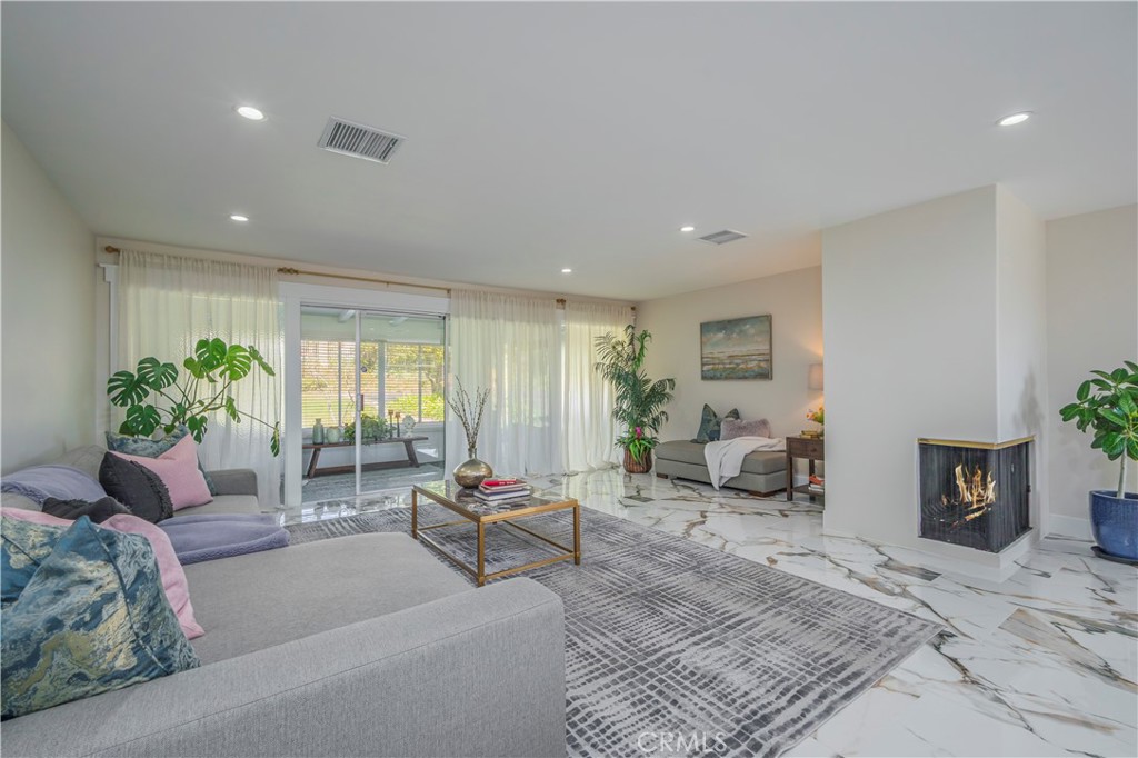 NEWLY REMODELED!!! This Magnificent SOUTH FACING one-story home located in the prestigious San Antonio Heights area in Upland. The owner has thoughtfully renovated with top of the line materials. It features 5 bedroom, 3 baths plus a HUGE BONUS ROOM. Large open concept living room with fireplace. Recesses lighting, new mohawk rev-wood tiles and laminate wood flooring throughout. Completely brand new bathrooms. Gourmet kitchen with horizontal grain custom cabinetry and quartz counter top with Waterfall edge on the island. Large backyard with Views of mountains, fruit trees, enclosed patio, and room for ADU. private gated side-yard with RV parking. Award-winning Upland school district. Close to wilderness walking trails, and parks. This could be your sprawling dream estate in this beautiful San Antonio Heights neighborhood! There is a one quarter share of water stock included with the purchase.