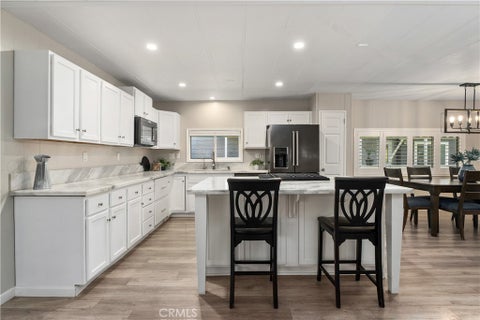 Photo of 27703 Ortega Highway #115, San Juan Capistrano, CA 92675 (MLS # OC26224787)