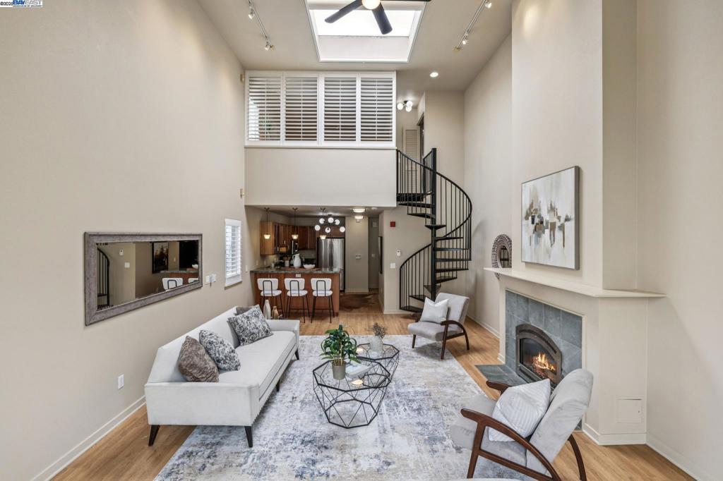 This stunning live/work loft features 1 bedroom, 1.5 bathrooms, floor to ceiling windows, skylights, and skyline views. Located on the top floor, corner unit with 1 car parking, low HOA dues, and in-unit laundry. Perfect for urban living and working. Intimate 46 unit building in the heart of thriving SoMa. Great walk, bike and commute scores.