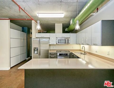 Photo of 645 W 9th Street #240, Los Angeles, CA 90015 (MLS # 25598531)