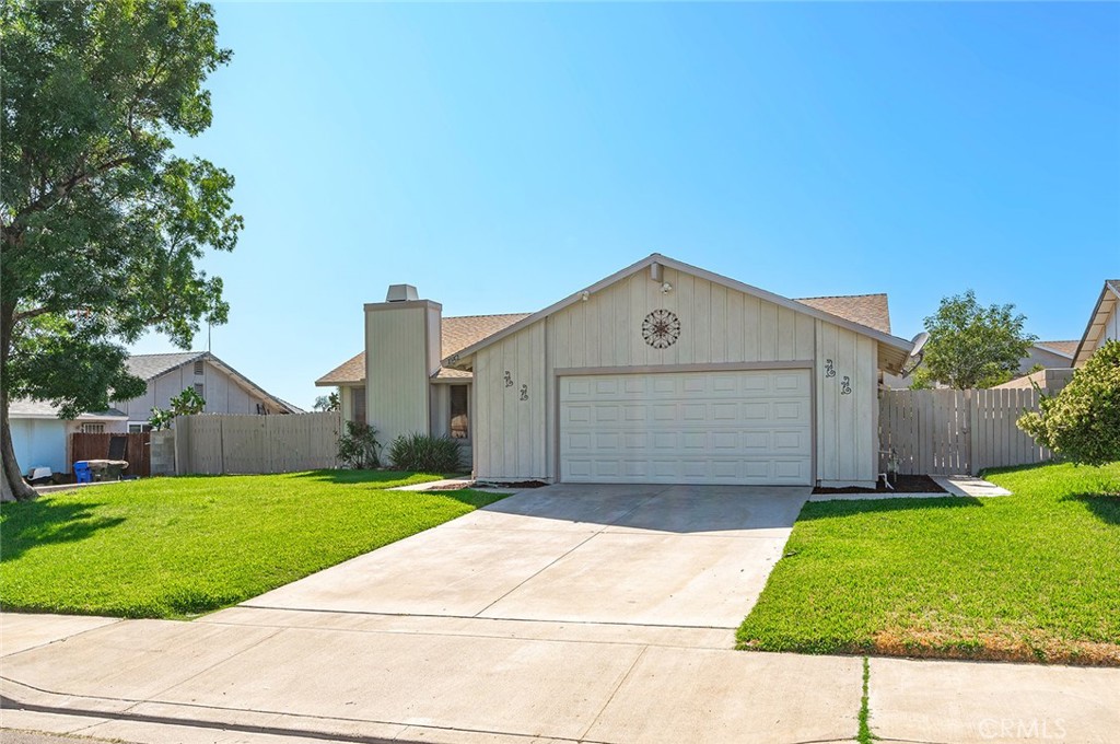 Welcome to this beautifully maintained 4-bedroom, 2-bathroom home offering space, style, and smart updates throughout. Featuring both a formal living and dining room along with a spacious open-concept kitchen and family room, this layout is perfect for both entertaining and everyday living. Enjoy peace of mind with a new roof, fresh exterior paint, new plumbing, and a newer A/C unit. Step outside to a covered back patio, a generous backyard with possible RV parking, and a large 2-car garage with plenty of extra storage space. Conveniently located near major freeways, excellent schools, and just minutes from shopping and dining at The Renaissance, this move-in ready home has it all—space, updates, and location!