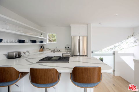 Photo of 29233 Heathercliff Road #3, Malibu, CA 90265 (MLS # 26987985)