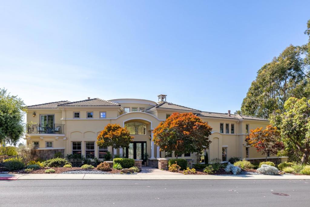 Winding your way through the eucalyptus-lined streets of The Uplands at Seascape is like driving through a world apart. One senses a certain magic in the air -- a rare intelligence in the way this hushed neighborhood lives in harmony with the natural world, its magnificent estates poised at the edge of the sublime. Here is your chance to own one such estate. Rising from a lush hillside, this architectural marvel was built to showcase the ocean from every vantage point. Inside, a colossal dome skylight pours sunlight onto a stately spiral staircase as it curves down into the heart of the home. Here, picturesque white columns frame a grand living room in which ocean views appear infinite through floor-to-ceiling windows that encircle the open space, end to end. Reclining around the built-in fire pit on the back terrace that spans the length of the home, gaze out in rapture at the cool, muted blues of the Pacific meeting the sage greens and earthy grey-browns of the grassy cliffside. This is the beauty of Aptos at its most irresistible. Breathe in the heady scent of eucalyptus as you take your morning coffee on one of multiple private balconies. There is a secret bonus room off the garage in addition to five glorious bedrooms. Here, luxury is more than an address; its a way of life.