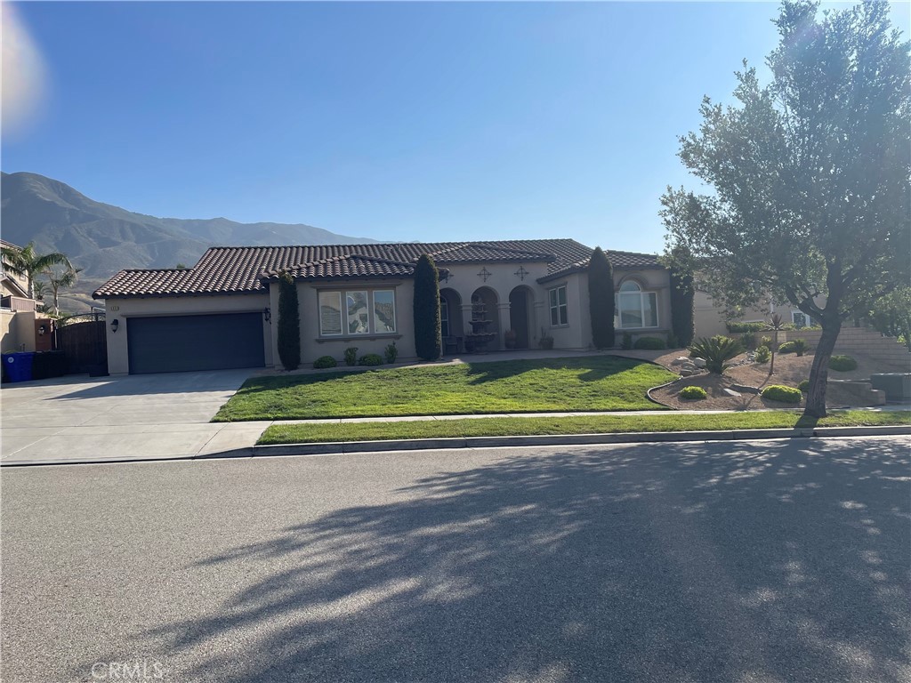 This BEAUTIFUL home is located in a well established neighborhood. A one of kind home that has everything you have been dreaming of. Spacious four bedrooms and three full bathrooms, Large Livingroom formal dining room that will accommodate an ex-large dining table with custom built-in wood bar from ceiling to floor. Spacious great room with fireplace, large kitchen counter for seating and separate dining area, walk-in pantry with access from formal dining room or kitchen. Inside laundry room!! Wood flooring through out this home ceiling fans and window shutters. When you want to entertain or relax enter your own oasis from your master bedroom or great room. Step out on a paved patio to a view of mountains and sky and a Sparkling pool with spa then look to your left an outdoor bar with counter for seating made of brick and tile roof glance to your right a brick custom barbecue island and firepit with seating area.
RV parking on side of home with custom wood gate, long driveway with clean landscaping front and back. THIS IS A MUST SEE.
WOW -- Foundation for a ADU with permits (approx. 22.5ft x 118ft) in corner of backyard --