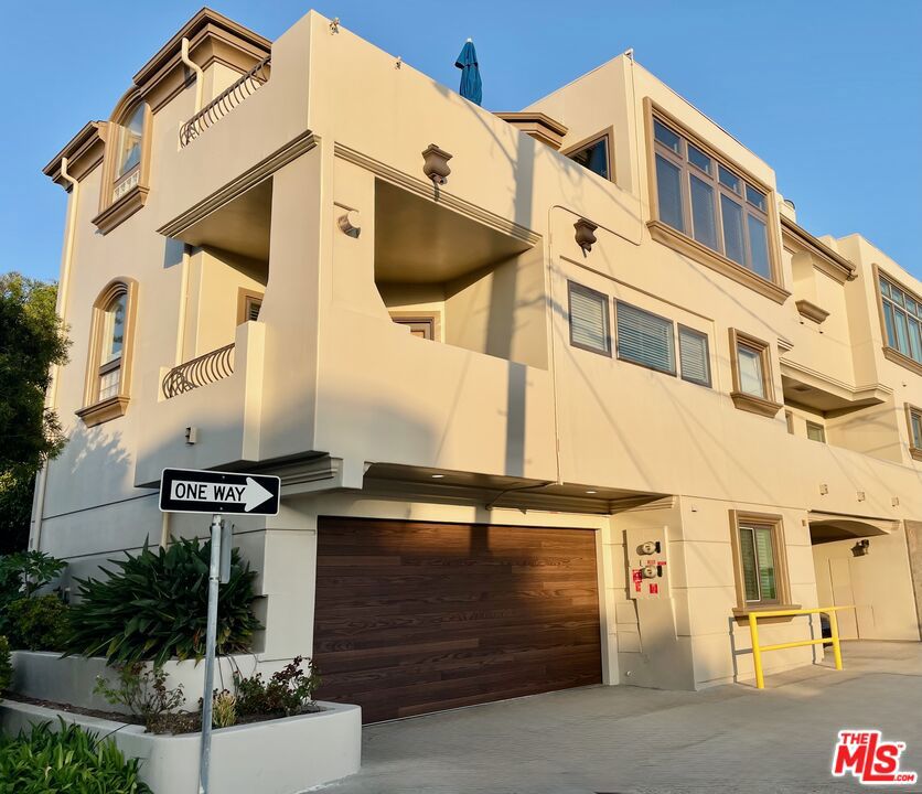 Panoramic Ocean Views in the Heart of Manhattan Beach, just two blocks from the iconic Manhattan Beach Pier, world class volleyball, and surfing. From floor to ceiling, this stunning coastal residence is framed by sweeping, ocean views and bathed in natural sunlight. Custom designed, this home blends timeless elegance with a relaxed beach lifestyle. Imagine waking each morning to the sound of the surf and ending each day with a Pacific sunset from your private deck taking in the views from Catalina to Malibu. This Manhattan Beach gem was designed for those who crave both luxury and the laid-back rhythm of coastal living. From spontaneous walks on the Strand to nearby cafes, to hosting sunset gatherings with the ocean as your backdrop, every detail of this residence invites you to live effortlessly by the sea. Offering over 2,000 square feet of thoughtfully designed living space, the open floor plan features gleaming maple floors, a spacious breakfast bar, two pantries, and a convenient dumbwaiter. The oversized great room is the heart of the home, boasting soaring ceilings, a dramatic fireplace, built-in cabinetry, and commanding ocean views from every angle. With stainless steel appliances, generous counter space, and three viewing decks, this home was crafted with the entertainer in mind. The luxurious primary suite is a private retreat, complete with its own ocean-view deck and fireplace, dual closets, a spa-inspired bath with frameless shower, and a charming alcove with built-in desk, all with whitewater ocean views as your backdrop. The second bedroom also enjoys its own deck, private bath, and stunning vistas, while the lower level offers a welcoming guest suite, full bath, laundry area, and additional storage. Just steps from top-rated restaurants and boutique shopping, this rare offering captures the very best of the Manhattan Beach lifestyle. **3-12 month lease. Offered furnished or partially furnished (negotiable). Tesla will be stored in garage and is available under separate auto agreement. Tenant is responsible for all utilities.