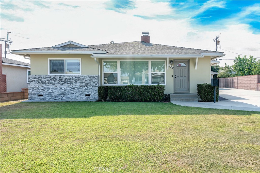 This stunning single-story home in West Covina has been meticulously renovated from the inside out, offering a completely fresh, modern, and worry-free living experience. Every detail has been thoughtfully updated to create a home that feels brand new, allowing you to simply move in and enjoy.
Step into a bright and open floor plan where natural light floods the space, highlighting the beautiful new flooring, recessed lighting, and fresh interior paint. The home is equipped with new windows, doors, and shutters, along with a brand-new central A/C and heating system and a new roof. For ultimate peace of mind, the electrical system has been entirely replaced with a new panel and wiring.
The heart of the home, the kitchen, has been completely transformed. It features elegant quartz countertops, all-new shaker cabinets, and a full suite of brand-new stainless steel appliances. A generous center island provides the perfect hub for both casual family meals and entertaining. All three bathrooms have been equally updated with sleek vanities, stylish tile, and contemporary fixtures.
This home offers 4 spacious bedrooms and 3 full bathrooms, including a cozy family room with a fireplace and ample natural light.
Outside, the large backyard is an entertainer's dream, featuring a covered patio and mature fruit trees, ideal for gatherings or quiet relaxation. A detached two-car garage and a wide driveway offer plenty of parking.
Located conveniently near schools, parks, shopping, and major freeways, this home truly embodies turnkey living with every significant upgrade already completed.