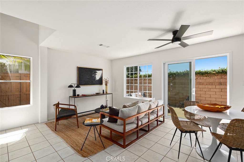 Rare and coveted, this detached two-story home in the heart of Costa Mesa is priced under $1M! Set within the sought-after Bay Street Villas, this 3-bedroom, 2.5-bath, turnkey gem provides a blend of comfort and style, while being mere minutes from Newport Beach, Balboa Peninsula, and Fashion Island.
A tree shades the front lawn, creating a peaceful tone before you begin exploring the refreshed layout. Sunlight pours through generous windows, reflecting off gleaming tile floors throughout the open-concept living, dining, and kitchen areas. Stainless steel appliances, recessed lighting, and new sliding glass doors that connect to the private patio create a perfect flow for casual nights in or entertaining with ease.
Upstairs, plush new carpet leads you to three tranquil bedrooms. The primary suite offers a large walk-in closet and an ensuite featuring dual sinks and a sleek oversized shower for a relaxing start or end to your day. Two more retreats share an updated hall bath, ideal for guests or as a remote office setup.
Fresh interior and exterior paint and a secluded terrace ready for weekend grilling or winding down under the stars add the finishing touches. With an interior laundry room, attached 2-car garage, dedicated visitor parking, and access to top-rated schools, shopping, and restaurants, your lifestyle here feels effortless. Come see what it’s like to live moments from the coast without compromising convenience!