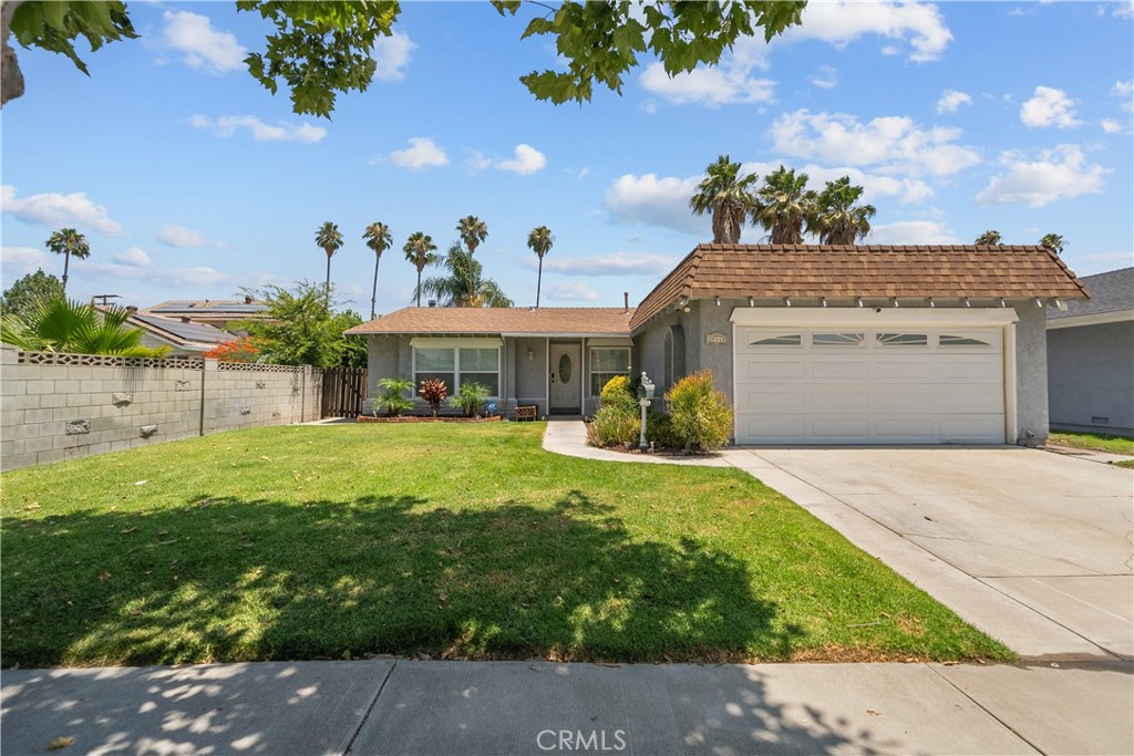Welcome to your Canyon Country dream home! This beautifully updated 4-bedroom, 2-bathroom stunner offers the perfect blend of comfort, style, and convenience. Step into the remodeled kitchen featuring quartz countertops, white shaker cabinets with soft-close drawers, updated appliances, and a custom tile backsplash—perfect for any home chef. Both bathrooms have been thoughtfully renovated with modern finishes. The hall bath boasts a contemporary walk-in tile shower and a stylish vanity. The primary suite includes a spacious walk-in closet, direct access to the pool area, and an en-suite bath with a gorgeous walk-in shower and elegant tile design. Enjoy both a formal living room and a cozy family room with a statement fireplace—ideal for relaxing or entertaining. Plantation shutters throughout add a touch of classic charm. Step outside to your private backyard oasis, complete with a sparkling pool that's perfect for those warm summer nights. This home is centrally located and within walking distance to Cedarcreek Elementary, Sierra Vista Junior High, and Canyon High School. Don’t miss your chance to own this move-in ready gem in a prime Canyon Country location!