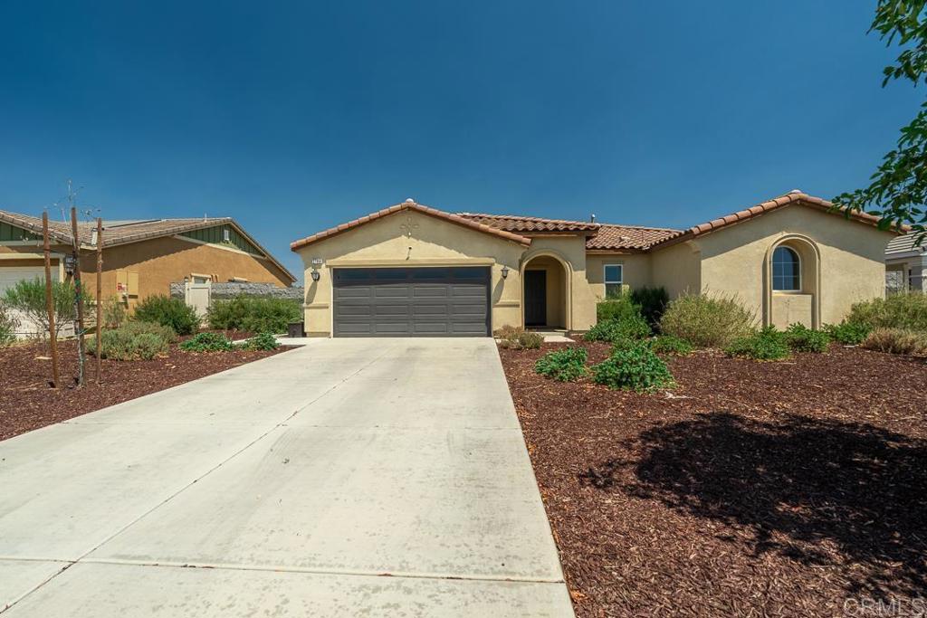 Welcome to your turnkey dream home! This beautifully maintained single-story offers a flexible layout with three spacious bedrooms plus a den that easily converts to a fourth. Move-in ready and spotless, it features a private backyard oasis with a concrete patio, windsail shade, grassy area, and cozy firepit with a walkway—perfect for relaxing evenings. The kitchen shines with quartz countertops, white cabinetry, and ample storage. The primary suite includes a walk-in closet and oversized linen storage. Located in a low-HOA community with parks, a dog park, and walking trails. Enjoy the convenience of new shops and businesses coming soon to this growing neighborhood. Best of all OWNED SOLAR!