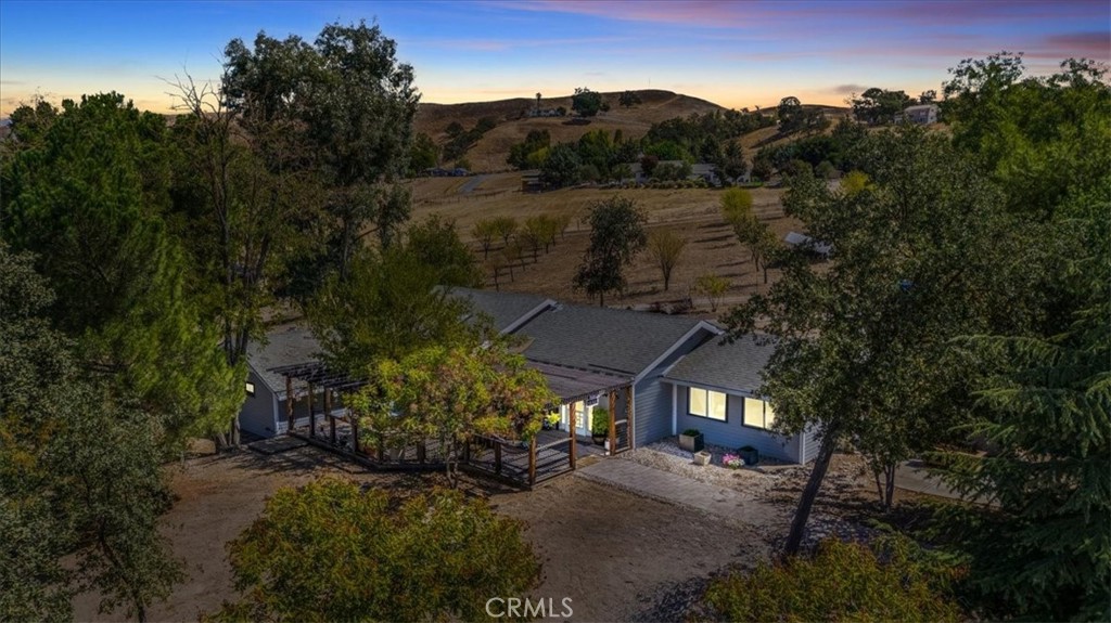 Welcome to 1890 Sagebrush Way! This hidden treasure in the highly sought-after Dresser Ranch neighborhood of Paso Robles presents an incredible opportunity for first-time homebuyers, investors, and those seeking spacious living with room to grow. Boasting 2,068 sq/ft of living space, this charming home features 3 bedrooms and 3 bathrooms, all situated on a generous 2-acre corner lot. Enjoy added privacy and a spacious outdoor area perfect for gardening, play, animals or entertaining, making it an ideal setting for gatherings. A standout feature of this property is the 2-car detached garage and adjacent 20'x40'x14' workshop—perfect for hobbies, additional storage, or a dedicated workspace. Whether you’re a DIY enthusiast or simply need room for projects, this versatile space can be tailored to fit your needs. While the interior and main garage could benefit from some updating, this presents a golden opportunity to design and customize your home to reflect your unique taste, allowing you to build equity along the way. Dresser Ranch boasts a friendly community with a vibrant local culture. This convenient location minutes from schools, parks, shopping, and dining, offering the perfect balance of peaceful living with easy access to essential services and entertainment. Don't miss your chance to add your personal touch to this property and become part of this thriving community. 1890 Sagebrush Way is not just a home; it's a unique opportunity waiting for you!