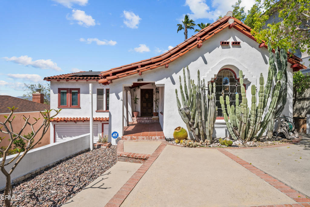 Discover the charm of Glendale living at 1513 E Garfield Ave, where classic elegance meets modern convenience. Step inside to find a beautifully maintained interior that preserves the home's original charm while providing all the comforts of a modern lifestyle. The living room features a cozy fireplace and a stunning stained-glass window, creating a focal point for relaxation and gatherings. Enjoy conveniences such as central AC & heating, and energy-efficient owned solar panels, EV charging unit. The property's central location places you at the heart of Glendale, offering easy access to the city's vibrant dining, shopping, and entertainment scene.But the real showstopper is the breathtaking views. Whether you're enjoying a morning coffee or an evening swim in your heated pool, you'll be captivated by the panoramic vistas that stretch out before you. This is more than just a home; it's a retreat where you can unwind and take in the beauty of your surroundings.Experience the best of both worlds--the serene feeling of a luxury private escape with the unbeatable convenience of a central location. Welcome to 1513 E Garfield Ave, where every day is an opportunity to enjoy the views, the charm, and the perfect Glendale lifestyle.