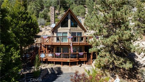 Photo of 38532 N Shore Drive, Fawnskin, CA 92333 (MLS # CV25161484)