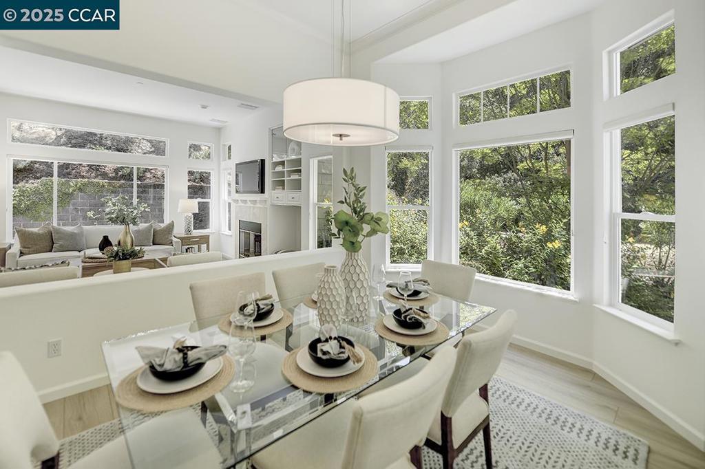 This home is one of only 63 single family homes in Rossmoor offering timeless luxury and contemporary architecture located on a premium lot with beautiful garden patio and surrounding open space providing lots privacy and lush views. The bright and inviting recently updated chef's kitchen creates a culinary haven for any gourmet enthusiast fully equipped with all the fine features you would expect including quartz counters and full backsplash, highly desired gas range, large stainless sink, wine & beverage refrigerators. Large breakfast nook leads to spacious patio for your outdoor living enjoyment. The relaxing family room with gas fireplace and formal dining room provides room for the whole family for all those special occasions. The luxurious primary suite offers a lovely sitting area and resort inspired en-suite bath with oversized stall shower & soaking tub complemented by walk-in closet. The home offers a generously size guest bedroom, office with Murphy bed that can easily be transformed into a third bedroom for your overnight guests. Additional appointments include sophisticated lighting fixtures, 10’ soaring ceilings, custom blended paint, luxury vinyl plank flooring, plush new carpet, ceiling fan, custom blinds, 2-car garage & golf cart garage~workshop......