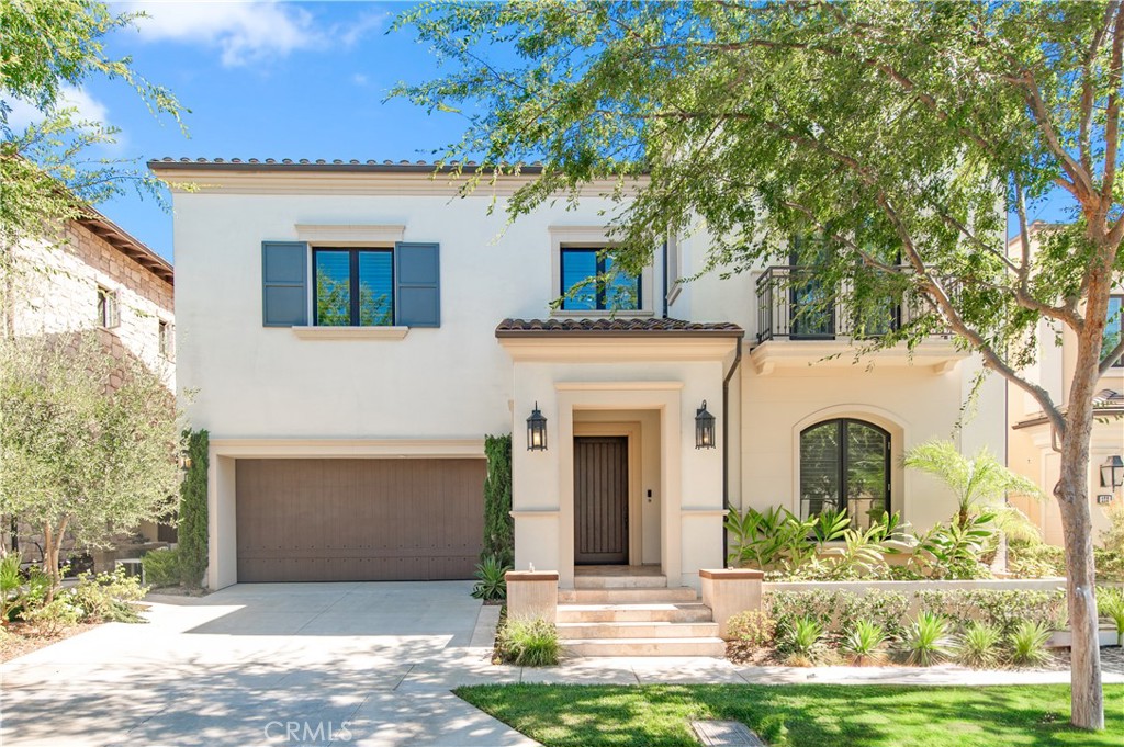 Nestled in the exclusive 24-hour guard-gated community of Hidden Canyon, this residence embodies timeless luxury and modern convenience. With 4 spacious bedrooms and 4.5 bathrooms, the home is highlighted by dual curved staircases, a two-story dining room, and an elegantly designed primary suite. The chef-inspired kitchen boasts Wolf stainless steel appliances, a Sub-Zero refrigerator, oversized center island, and a walk-in pantry—perfect for hosting family and friends. Expansive sliding glass doors open to a covered California room and a large courtyard, seamlessly blending indoor and outdoor living. This home also includes paid-off solar panels, a whole-house water softener, pre-installed audio wiring, and is beautifully furnished throughout with Restoration Hardware (RH) designer furniture. Hidden Canyon residents enjoy a resort-style lifestyle with a sparkling pool, cabanas, outdoor fireplace, BBQ areas, playground, and a multipurpose clubhouse with full kitchen. Ideally located near Laguna Beach, Irvine Spectrum, Fashion Island, John Wayne Airport, and major freeways, and served by the highly acclaimed Irvine Unified School District, this home offers unmatched value in one of Orange County’s most coveted neighborhoods.