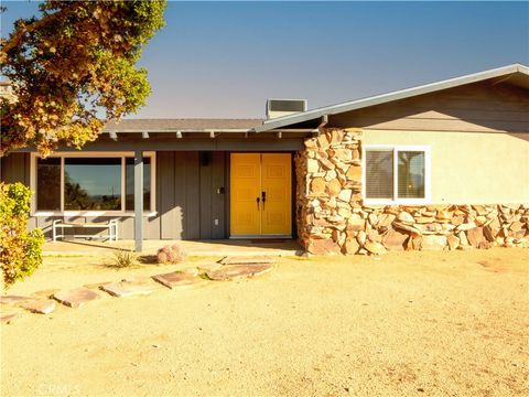 Photo of 9163 Joshua Lane, Yucca Valley, CA 92284 (MLS # JT25226288)