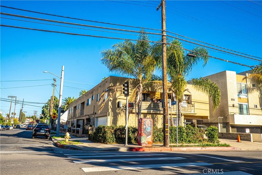 Prime location in Los Angeles with upside potential • 8 units with a great mix of both 2 bed and 1 bed units, balconies, garages, carports and parking spaces.  Separate gas and electric meters.  Near Paramount Pictures Studio, shops, restaurants and the Hollywood Walk of Fame, with convenient access to 101 freeway and public transportation.