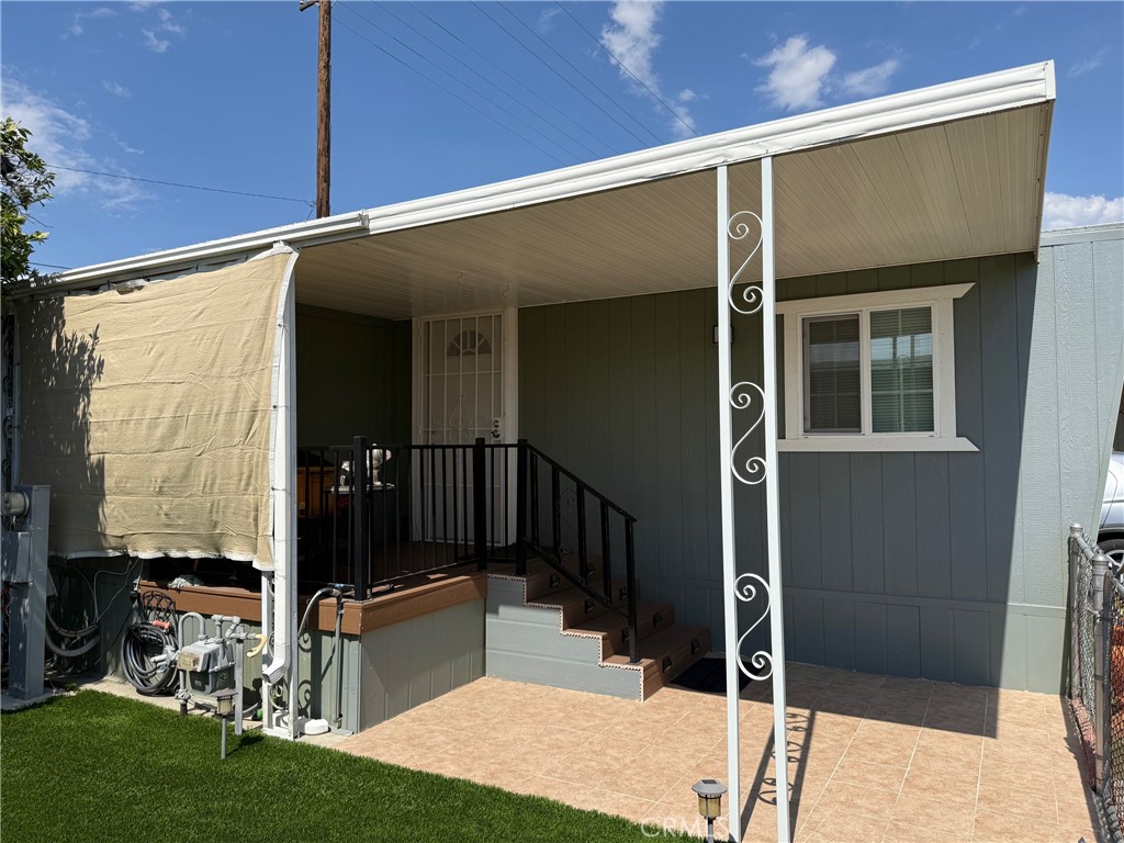 Welcome to Space 38 at 260 N Lyon Avenue, located in the Devonshire Downs 55+ senior community in Hemet. This charming and affordable 2-bedroom, 1-bathroom manufactured home offers approximately 540 square feet of thoughtfully updated living space—perfect for those seeking low-maintenance comfort in a peaceful neighborhood setting. Step inside to find a bright and open layout enhanced by updated flooring throughout, creating a fresh and inviting atmosphere. The living area flows seamlessly into the dining nook and the recently updated kitchen, featuring refreshed cabinetry that adds both style and practical storage. Both bedrooms are well-sized, while the full bathroom is conveniently located and functional. Additional highlights include central heating and air conditioning for year-round comfort, a composition roof, and an easy single-level floor plan. The exterior offers space for a seating area or garden, and residents enjoy the quiet, well-maintained streets of Devonshire Downs—a well-established senior park. Situated just minutes from major shopping centers, restaurants, medical offices, and everyday conveniences, this home combines tranquil living with easy access to everything you need. Whether you're downsizing, retiring, or looking for a turn-key affordable home in a great location, Space 38 is a wonderful opportunity. Don’t miss your chance to enjoy relaxed senior living in Devonshire Downs!