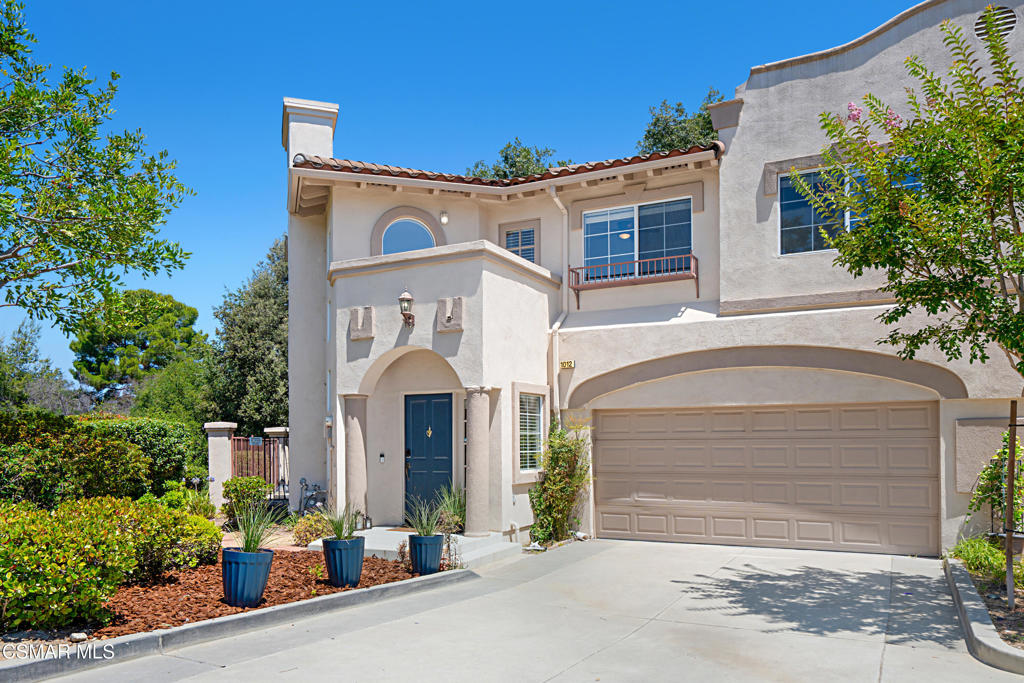 Every day feels like a retreat in this spacious, light-filled townhome set on an expansive and private corner lot. Inside, beautiful wide-plank vinyl-wood flooring, soaring two-story ceilings, oversized double-pane windows, and views of the mature trees create an open and airy ambiance throughout. The cozy fireplace becomes the heart of the living area, perfect for quiet moments or entertaining guests. Featuring sleek quartz countertops, stainless steel appliances, soft-close cabinets and drawers, ample storage, and direct views of the lush backyard and garden, the open-concept kitchen is designed for both function and style. A spacious laundry and storage room, plus a convenient half bath complete the downstairs. Upstairs, the Primary Suite is a true sanctuary with two walk-in closets, a double vanity, and a large soaking tub positioned to capture relaxing treetop views. Three secondary bedrooms, two with a private sunlit balcony, provide plenty of space for family, guests, a home office or gym. The outdoor space is a rare gem--low-maintenance yet expansive, with patios ideal for alfresco dining, grassy areas for pets or play, and blooming garden beds. A $40,000 battery backup system dramatically lowers utility costs and is capable of providing power for up to 3 days during outages adding great peace of mind. Parking and storage are enhanced by the large driveway and direct-access 2-car garage. The beautifully maintained community includes a sparkling pool and spa--perfect for sunny afternoons and restful weekends.