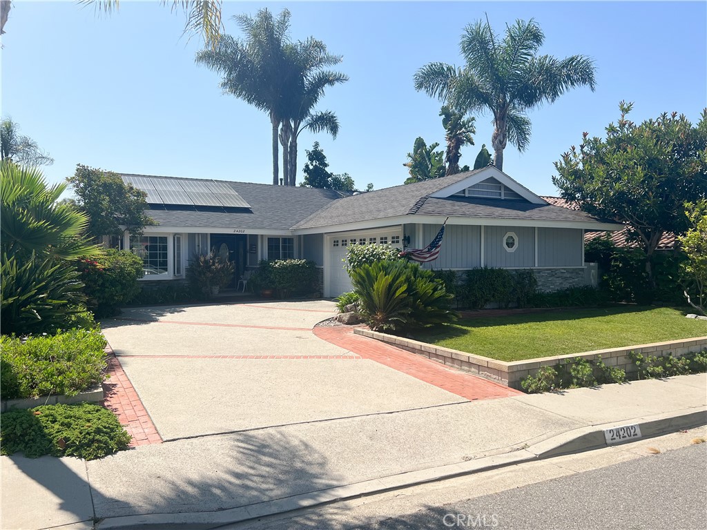 This beautifully maintained one-story home boasts sweeping views and an extensive list of upgrades. Positioned away from the street, it features a spacious driveway and meticulously landscaped grounds, providing exceptional curb appeal. Inside, the home is filled with natural light, and the owner is committed to applying a fresh coat of paint throughout before your move-in date.
The updated kitchen is a chef's dream, complete with granite countertops, sleek white cabinetry, a 5-burner gas stove, and a spacious 3-door stainless steel refrigerator. Gorgeous drop lighting enhances the ambiance, and direct access to the side yard makes it perfect for entertaining.
Natural light floods the living space through a charming front bay window, while a large double slider opens up to the stunning backyard. Here, you'll find peekaboo ocean views, an expansive pool and spa, enchanting water features, and breathtaking canyon views.
The primary bedroom is a true retreat, featuring an ensuite bathroom and oversized slider that offers serene backyard views. Ample closet storage is provided by a large mirrored closet, ensuring plenty of space for your belongings. The upgraded bathrooms showcase beautiful granite and custom stonework, adding a touch of luxury.
The secondary bedroom includes direct access to the yard, as well as convenient access to the laundry room and garage. A large custom linen closet is currently being built and will be ready upon move-in, providing even more storage options.
Additional highlights of this home include a spacious laundry room, a 2-car garage equipped with electric car charging. Property has solar leading to a reduced electric bill—truly a huge bonus! Ceiling fans in every bedroom ensure comfort year-round.
Located close to Dana Point Harbor, Salt Creek Beach, shopping, and restaurants, this home offers the perfect blend of tranquility and convenience. Don’t miss your chance to experience this exceptional property!