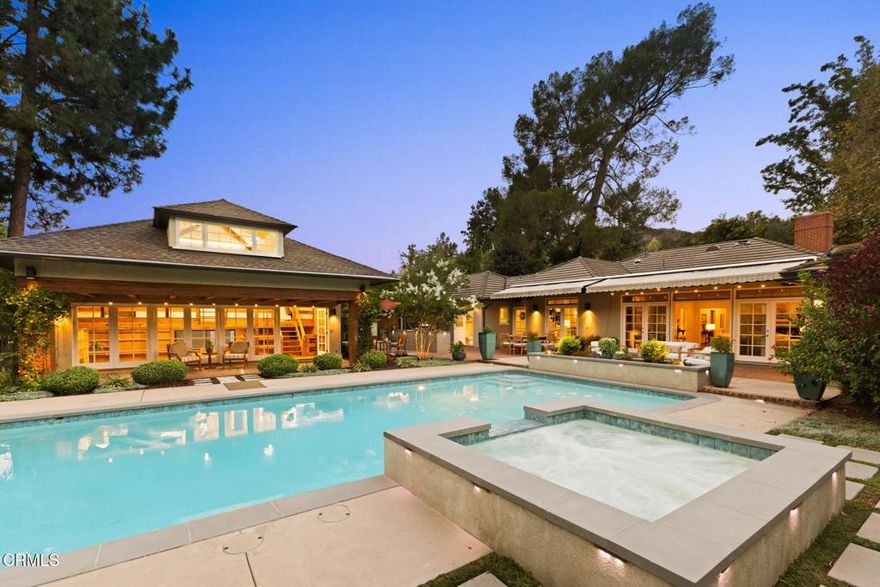 Nestled in Pasadena's most coveted neighborhood of Linda Vista, this refined estate offers a rare blend of architectural elegance, privacy and natural beauty.  Set on a flat half acre of manicured grounds sits this 3,625sf, four bedroom home.  Step into a grand light filled living room and sun room where expansive glass doors frame tranquil views of the sparkling pool and lush patios, perfect for seamless indoor-outdoor living and entertaining.  With formal living and dining room, den/office, a thoughtfully upgraded kitchen and breakfast area, den and three cozy fireplaces, the single story layout is elegant yet functional.  The backyard is a true oasis, complete with a sparkling pool and spa, full outdoor kitchen, a built in fireplace, and expansive patios, perfect for year round entertaining.  An impressive 1285sf additional structure offers endless possibilities for a guest house, studio or home office.With timeless elegance and exceptional amenities, this property is a rare gem that blends luxury and comfort in equal measure.