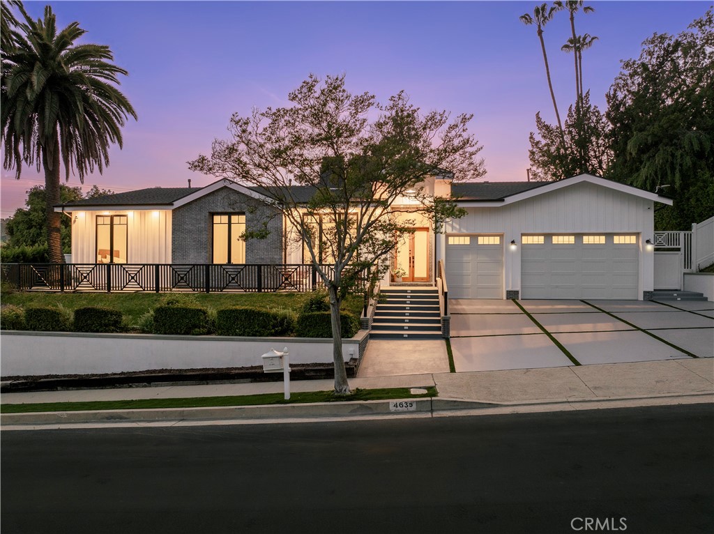 Property available furnished at higher rental rate. Welcome to your dream home in Tarzana! This stunning 5-bedroom, 5.5-bathroom remodeled home offers the pinnacle of luxury living. Situated in the prestigious neighborhood of Tarzana, this home is a masterpiece of modern design and comfort. Step inside to discover a spacious floor plan filled with natural light. Continue the entertainment in your bar/lounge area which seamlessly opens up to your formal living room. The formal living room area features a beautiful stone fireplace, the kitchen offers an oversized island, Thermador appliances and an eating area that offers both indoor and outdoor living. The primary suite includes a stone fireplace, pocket sliding doors to the backyard, a spacious walk-in closet, dual sinks and a spa like tub. Four generously sized ensuite bedrooms with walk-in closets and a laundry room can be found throughout the home. Step outside to the expansive backyard oasis, where a sparkling pool and rejuvenating spa await. Fire up the outdoor BBQ and dine al fresco under the stars, surrounded by lush landscaping and serene ambiance.