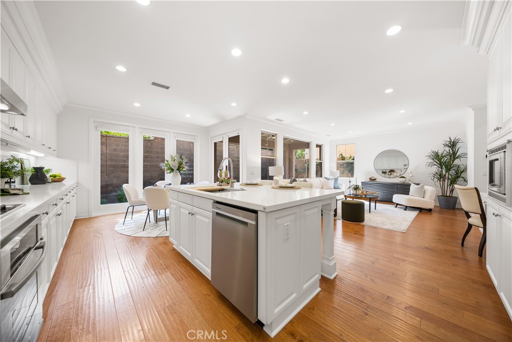 Welcome to a beautifully updated 4-bedroom, 2.5-bathroom home designed with today’s families in mind. Tucked within one of Irvine’s most central and sought-after neighborhoods, this modern residence offers the perfect blend of comfort, style, and long-term value.The thoughtfully laid-out main level features an open-concept living and dining space that connects effortlessly with a sleek, modern kitchen—complete with white cabinetry, new quartz countertop, and an easy flow to a private backyard. Whether it's weekend barbecues or quiet evenings under the stars, the outdoor space is ideal for both entertaining and everyday enjoyment. Upstairs, you'll find all four bedrooms, including a spacious primary suite with ample natural light. Each room is designed for comfort and flexibility—perfect for growing families, work-from-home setups, or guest accommodations.Just a short stroll to nearby parks and greenbelts, this home also enjoys convenient access to shopping, dining, and major freeways, making commutes and weekend outings a breeze. Zoned for top-ranked Irvine Unified schools—especially a highly rated elementary school within close proximity—this location checks every box for family living. Whether you're looking for a forever home or a smart investment in one of Irvine’s highest-demand areas, this property offers an exceptional opportunity to enjoy the best of Southern California living.