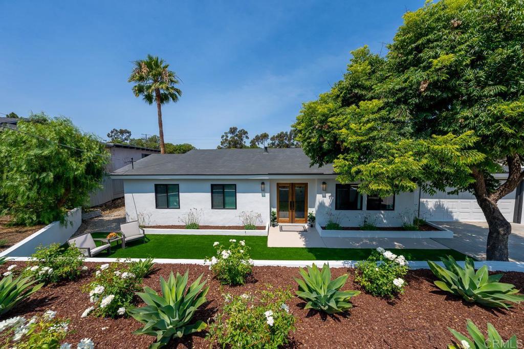 Welcome to this Stunning, Fully remodeled 4-bedroom, 2-bathroom Single Story Home Located in the Desirable Fletcher Hills Neighborhood of La Mesa! Meticulously Renovated with High-quality Finishes and Thoughtful Attention to Detail Throughout, this Home Offers Modern Luxury, Comfort, and Functionality on a spacious 1/3-acre lot! Practically Everything is New with Stylish Designer Touches from the Floors, to the High-end Smooth Coat Walls, to the Fixtures! Some Interior Features Include: Custom Double-Door Entry for an Elegant First Impression; Built-in Electric Fireplace with Cozy Lighting and Room-Heating features; New Luxury Vinyl Plank Flooring and Designer Lighting throughout; Expanded Hallway with Utility Closet, Built-in Storage Cabinets and a Stunning Quartzite Feature Wall. The Spacious Oversized Primary en suite Boasts Two Walk-in closets, a Double Vanity with Lighted Mirror, a Beautiful Walk-in Shower with Glass Enclosure and Designer Tile Work, Plus a Sliding Door Leading Out to a Private Covered Patio for Relaxing while being Surrounded by Nature. The Gourmet Kitchen offers an Abundance of Natural Light coming from the Large Skylight, Quartzite Countertops and Sit-up Island, Custom Soft-close Cabinetry and Hardware, Additional Pantry Storage, Designer Backsplash, 6-Burner Gas Range, Built-in Microwave Drawer and Wine Fridge, and a Glass Slider Leading to the Main Covered Patio area for Dining, Entertaining and Relaxing Year Round! This Home is also Energy Efficient with Comfort Upgrades including a Brand New 4-ton Dual Power Central Heating and A/C System, All-new Ductwork and Blown-in Attic Insulation (R-38), as well as New Dual-pane Windows and Sliding Doors. The Exterior Features New Stucco and Fresh Paint, Spacious Front and Backyards with Lush Landscaping, Automatic Sprinkler and Drip System with Timers, New Custom Fencing, and a Stairway Leading to another Large Usable Outdoor Space with Room to Potentially Build a Pool, Sports Court or even an ADU, if so Desired! The Extra Deep 2-Car Garage Features a New Energy Efficient Gas Water Heater, Finished Walls and a New Chamberlain Smart Garage Door Opener with Battery Back-up. This Home is also Situated in a Prime Location, Minutes to Lake Murray, Scenic Hiking Trails, Cowles Mountain, Shopping, Schools, Parks, Freeways (I-8)(I-125) (I-52) and Just Down the Road from the Popular John A. Davis Family YMCA! The High Quality Workmanship of this Turn-Key Home Blends Luxury, Comfort, and Practical Upgrades with a Very Warm and Inviting Vibe Throughout, Feeling Larger and Showing even Better in Person, Truly! Don't Miss the Chance to Own One of the Finest Remodeled Homes in Fletcher Hills! It Will Not Dissappoint!