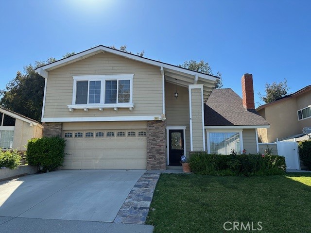 Stunning Newbury Park Home in model condition! Open floor plan with cook's kitchen, newer appliances, and loads of cabinet and counter space, living room, family room, freshly painted and new wood floors- Upstairs you will find a bonus area, large bedrooms, and main bedroom. The rear grounds have mature trees which give great shade and privacy. Close to Newbury High School. Walk to Trader Joe's. community pool and center, gardener and HOA included. hurry on this one!!