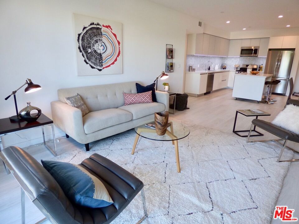 SEVENTEEN31 Federal, a New complex by Nayssan Properties, completed in 2018 in West LA! Bold and unique contemporary building with a beautiful and modern LARGE FRONT FACING 4Th FLOOR 3 bedroom/2.5 bathroom unit on a wonderful street with AMAZING FLOOORPLAN. Spacious apartment with open floors plan and high ceilings and large balcony with great views! Large bedrooms with plenty of closet space. Stainless steel appliances, luxury finishes, custom tile and marble, and in unit washer/dryer! Two parking spaces per unit. On site manager. Walking distance to famous Sawtelle Blvd where you can enjoy the great restaurants, bars, and nightlife. Huge roof top deck where tenants can relax during the day and enjoy the sunset with unobstructed 360 degree views of the city including Santa Mountains, Century City Skyline and Pacific Ocean views. SEE REMARKS FOR SHOWING INSTRUCTIONS.