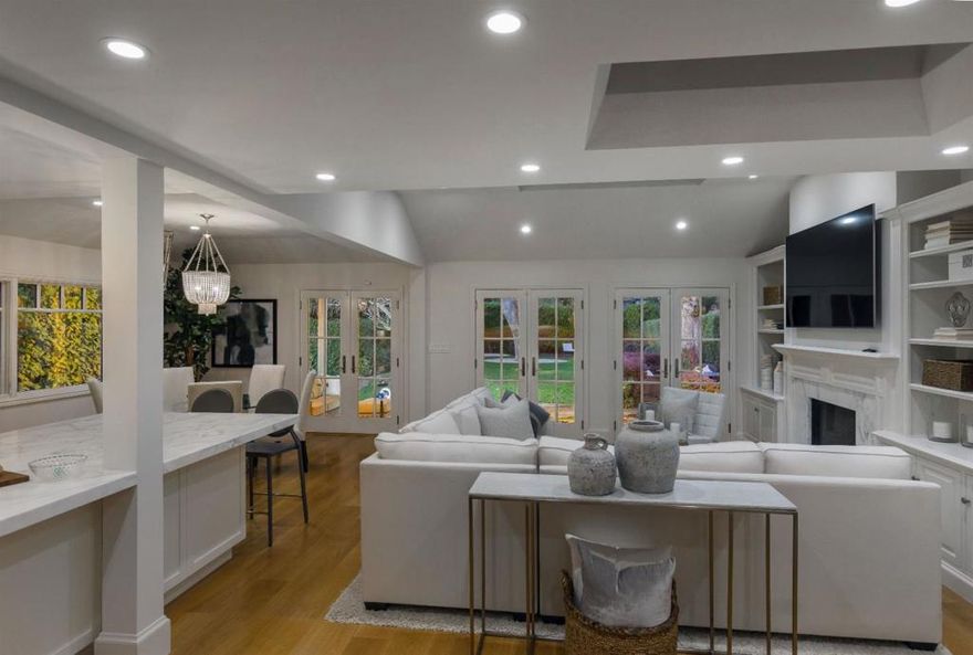 Spectacularly remodeled in 2018, with designer finishes throughout, this home is not to be missed. With over 4500 square feet of living space, it offers an open concept main floor with gourmet chef's kitchen, beautiful family and dining area lined with French doors accessing the manicured, private backyard. The lower level has a media/entertainment area, a 2000 bottle wine cellar, wet bar, office and bedroom and incredible bathroom with a state of the art steam shower. Completing the home on the upper level are four bedrooms and two bathrooms, including a master suite with large walk in closet. Located steps from downtown Menlo Park, Sacred Heart and Menlo Schools, and the Menlo Circus Club. Highly acclaimed Menlo Park public schools.