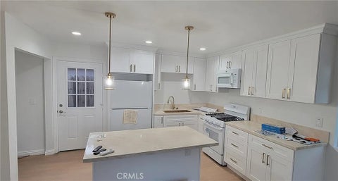Photo of 424 Poplar ST, Compton, CA 90220 (MLS # SB26184430)