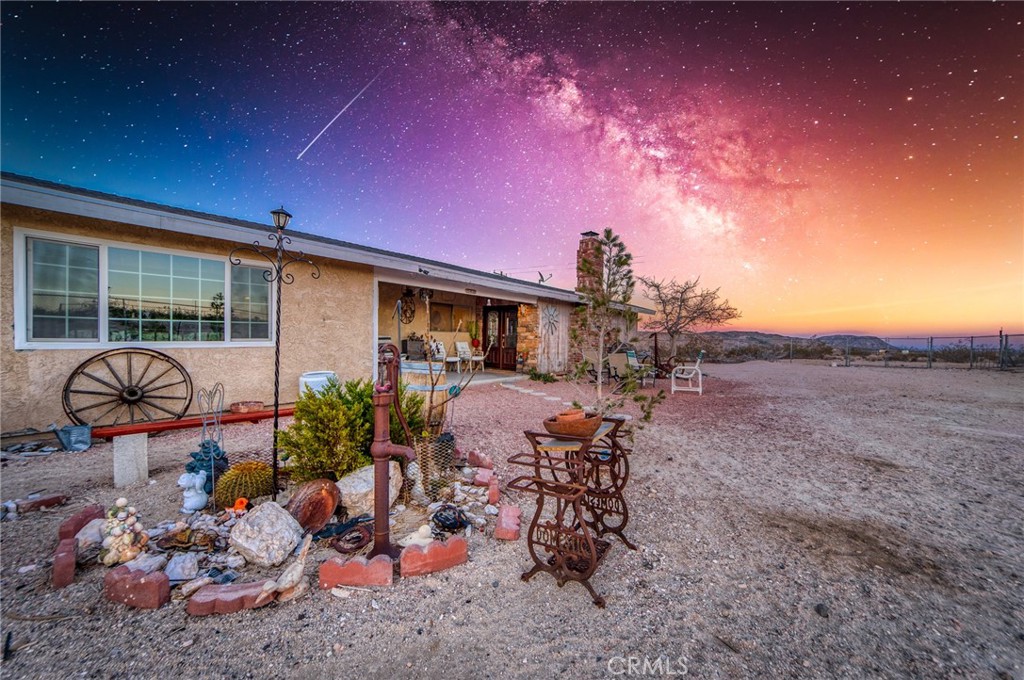Desert Beauty on 5 Scenic Acres – Updated 2 Bed, 2.5 Bath Home with Loft & Views
Discover your perfect desert escape in Landers! Set on 5 expansive and scenic acres, this beautifully updated 2-bedroom, 2.5-bath home blends modern comforts with wide-open space and panoramic views in every direction. Take in the dark skies from the swim spa and after, snuggle up next to the warmth of the fire-pit.
Step inside to a stunning kitchen with granite countertops, stainless steel appliances, and a large center island—ideal for cooking, entertaining, or simply enjoying the peaceful surroundings. The kitchen flows effortlessly into a cozy living room, where a warm fireplace creates a welcoming atmosphere.
The primary suite is a true retreat, featuring floor-to-ceiling cabinetry, a stylish barn door leading to the en-suite, a luxurious soaking tub, and ample storage throughout.
Upstairs, the spacious loft serves as a second bedroom or creative space, complete with its own private bathroom and access to a large deck offering sweeping views of the high desert landscape.
An oversized two-car garage with high ceilings provides plenty of room for parking, storage, or a workshop. Major updates including the HVAC system, roof, drywall, and more mean peace of mind and move-in readiness.
Whether you’re looking for a full-time residence, a weekend retreat, or a potential investment opportunity, this unique desert home offers the space, style, and serenity you've been searching for.