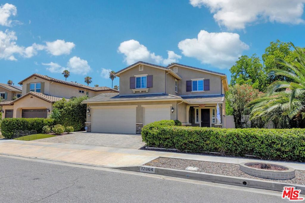 Fabulous property with beautiful curb appeal situated in Lake Balboa neighborhood built in 2015. This home offers a modern lifestyle retreat. Emphasizing proportion, light and flow, this home is crafted for entertaining where you'll enjoy an unparalleled flow between indoor/outdoor living. Enjoy gatherings in the spacious living/dining area graced by a fireplace and sliding doors that lead out to the rear yard. The kitchen is equipped with stainless steel appliances including double oven, walk-in pantry, granite counters, backsplash and island with seating. The formal dining room is currently being used as a Video Podcast Studio. The open concept kitchen and living room makes it perfect for entertaining, allowing a seamless flow. Warmth and natural light abound throughout the ideal floor plan. A bedroom and a full bath is conveniently located on this floor. Second floor consists of a flex room with surround sound that can be used as an office, media room or could be converted to a 5th bedroom. The primary suite complete with spa-inspired bath with separate jetted tub, double vanity and a gorgeous custom walk-in closet. 2 additional bedrooms, a full bath with double vanity and laundry room completes this floor. Enjoy entertaining in the low maintenance rear yard with open patio. Additional features includes 3-car-garage tankless water heater, solar panels, double pane windows, Ring Pro security doorbell, 8 Camera HD Security System w/ DVR, hidden Programmable Exterior LED Strip Lighting, recessed lighting and a built-in surround sound system. Solar panel is owned and paid off. Sellers do not have electric bill. The house is fully equipped with podcast production which is NOT included in the sales price. They include 3 Sony cameras, Pro lighting, Green Screen Wrap, Podcast and Livestream Setup & Pro Audio. The Podcast studio supports content creation, interviews or virtual meetings. The property is minutes to shops, restaurants, school and park. This beautifully-crafted SoCal living everyone covets, awaits your arrival for the new lifestyle you've been looking for. Come and take a tour while it's still available. There is a $729K ASSUMABLE LOAN at 2.898% int.!