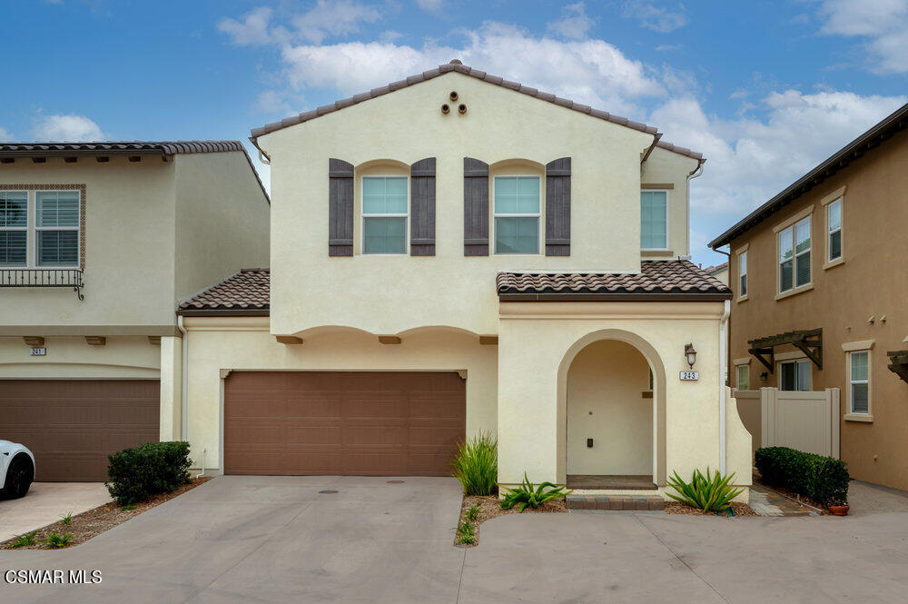 Welcome to 243 Stonegate Rd., Camarillo - a beautifully appointed home in the desirable Summerville community, offering pride of ownership and thoughtful upgrades throughout.This 3-bedroom, 2.5-bath residence features an inviting floor plan centered around a stylish interior patio, perfect for seamless indoor-outdoor living. The chef's kitchen boasts an elegantly designed island with bar seating, a cozy eat-in area, a striking herringbone tile backsplash, and all stainless-steel appliances. It opens effortlessly to the family room and dining area, creating an ideal space for entertaining and connecting directly to the patio.Downstairs is finished with luxury vinyl plank flooring, while a conveniently located powder room serves the main living areas. Upstairs, all three bedrooms are accompanied by a versatile loft--perfect for a home office, media space, or play area. The spacious primary suite offers a large walk-in closet and a well-appointed bathroom. Plush carpeting adds comfort to the bedrooms, and the laundry room is conveniently located upstairs.Additional highlights include a two-car garage and a prime location near Mel Vincent Regional Park, schools, shopping, and easy freeway access.