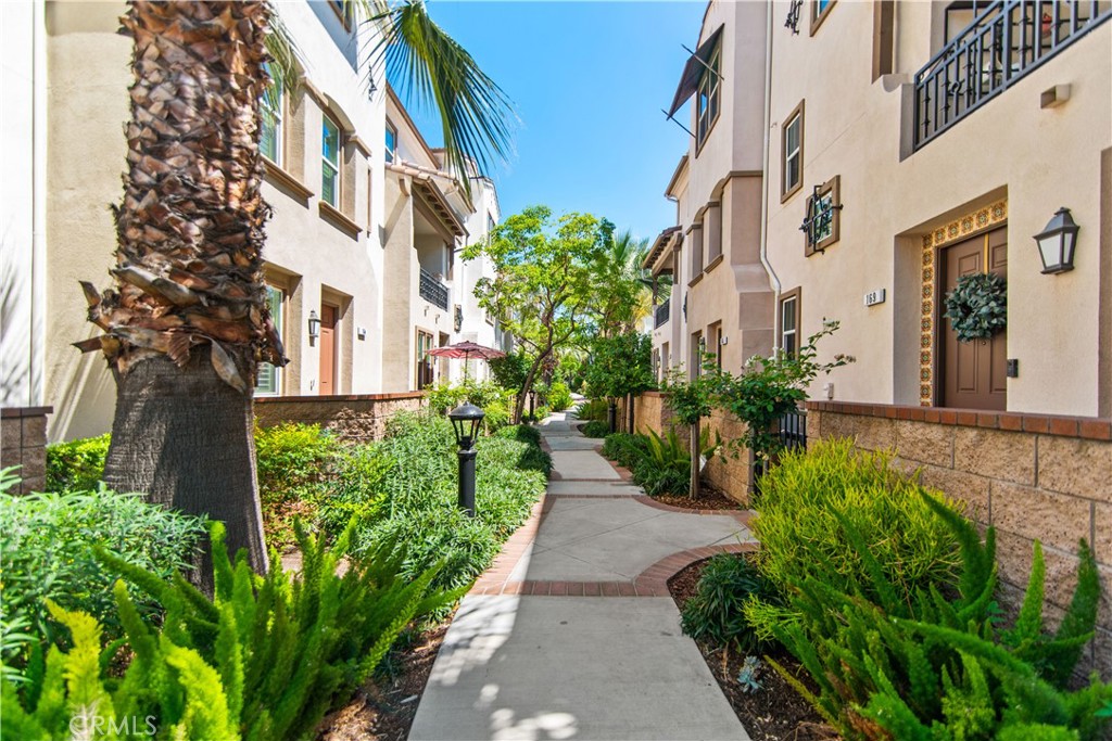 Fantastic End Unit Condo located within the Orchard Community built in 2017. This unit is 3 levels of stylish modern upgrades featuring an open floor plan. Features include water resistant engineered hardwood floors, kitchen with granite countertops and stainless-steel appliances it also adjoins the dining area and living room as well as sliding glass door which opens onto your private balcony additionally this level includes a cheerful powder room.
Down 1 level is the attached 2-car garage with indoor laundry area while to the front of the house is your gated private front porch leading to your entry way in the house. Upstairs on the 3rd level you will find 2 suites one of which has a large walk-in closet each suite has their own full bath.
The Community amenities include a pool and clubhouse. Transportation is a breeze with the close proximity of the Metro Station, freeway access to the 10, 60 and 210 corridors as well as Ontario International Airport. Close to Red Hill Country Club and Golf Course, Shopping, Entrainment and Dining at nearby Downtown Upland, Victoria Gardens and Ontario Mills.