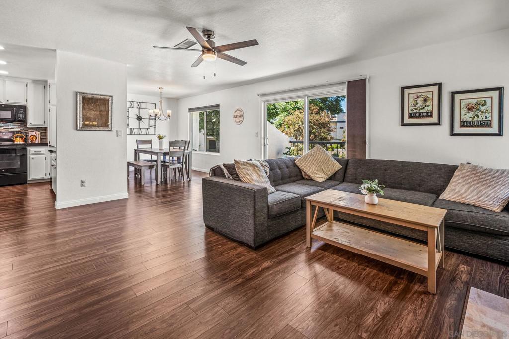Spacious & upgraded upstairs end unit with lots of natural light. The interior features large dual pane windows with accordion blinds, updated flooring, fresh paint, & wood burning fireplace with marble surround. Bathrooms updated with marble vanity counters, a remodeled primary shower, & replaced toilets. Central heat and a/c, along with stylish ceiling fans in the bedrooms & living room. The primary bedroom offers double closets, and both bedrooms are generously sized. The kitchen is upgraded with recessed lighting, marble countertops, subway tile backsplash, built in microwave, & all appliances included. Smart features include thermostat & doorbell. The private patio features a large storage closet with full sized laundry. Parking is convenient with two spots located directly in front of the unit, one covered with a storage cabinet. The HOA covers water, hot water, and trash. Community amenities include a pool, hot tub, tennis/pickleball courts, basketball court & gated community. The HOA also recently replaced the roof. The complex offers a pedestrian gate with direct access to a shopping center. Trader Joe’s close by plus easy freeway access. Spacious & upgraded upstairs end unit with lots of natural light. The interior features large dual pane windows with accordion blinds, updated flooring, fresh paint, & wood burning fireplace with marble surround. Bathrooms updated with marble vanity counters, a remodeled primary shower, & replaced toilets. Central heat and a/c, along with stylish ceiling fans in the bedrooms & living room. The primary bedroom offers double closets, and both bedrooms are generously sized. The kitchen is upgraded with recessed lighting, marble countertops, subway tile backsplash, built in microwave, & all appliances included. Smart features include thermostat & doorbell. The private patio features a large storage closet with full sized laundry. Parking is convenient with two spots located directly in front of the unit, one covered with a storage cabinet. The HOA covers water, hot water, and trash. Community amenities include a pool, hot tub, tennis/pickleball courts, basketball court & gated community. The HOA also recently replaced the roof. The complex offers a pedestrian gate with direct access to a shopping center. Trader Joe’s close by plus easy freeway access.