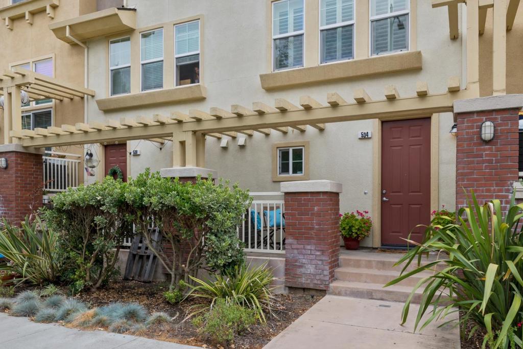 Welcome to this exquisite residence in the heart of vibrant San Jose. This elegant home offers an ideal blend of style and functionality across approx 1,280 sq. ft. of living space. Two bedrooms and two and a half bathrooms, each designed with comfort and sophistication in mind. As you enter, stairs usher you to a sunlit main living area adorned with Brazilian Cherrywood flooring, setting a warm and inviting ambiance. The efficient kitchen is a chefs dream, equipped with stainless steel appliances, including a refrigerator, a four-burner gas stove, microwave, dishwasher, and a dual stainless steel sink. Classic oak cabinetry and granite counters frame this culinary space, enhanced by a newly installed Nobelford Oak waterproof laminate floor. The main floor also hosts a convenient half bath with a pedestal sink. Ascend the stairs to find the private bedroom wing, where both bedrooms are carpeted ensuites. The primary bath boasts dual sinks, and a walk-in shower, while the second bath offers a tub/shower combo. Tandem garage with ample storage. Noteworthy are the dual pane windows, fresh paint, and wood shutters that accentuate the living space. Enjoy the proximity to Historic Japantown, delightful dining and shopping experiences. Monthly HOA dues are $412.(Buyer to Verify HOA Fee)