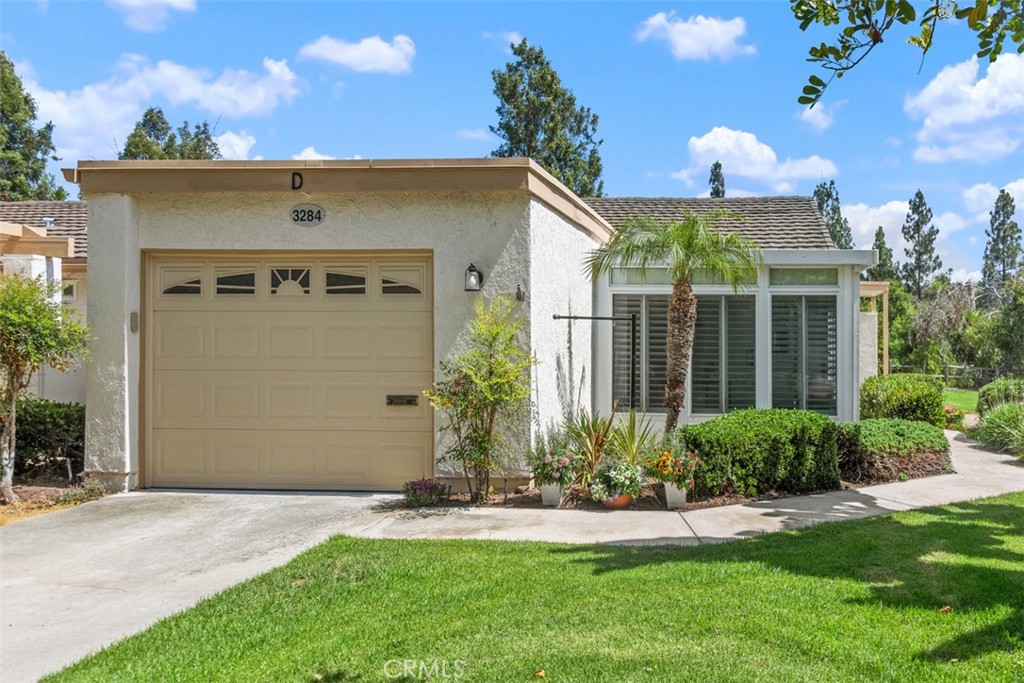 WELCOME TO YOUR SLICE OF PARADISE! This isn’t just a home. This is all about the ZEN—it’s a single-story stunner that feels like the model home. La Princessa Model rarely comes on the market. Stylishly reimagined, and move-in ready, this beauty sits peacefully on a tree-lined cul-de-sac with lovely views that remind you why you live in California. Step inside and you’ll instantly feel the difference: wide-open floor plan, soaring natural light, and a living room anchored by a custom electric fireplace with a shiplap accent wall—perfect for cozy nights or showing off to your friends. The chef’s kitchen is equally swoon-worthy with leathered white dolomite countertops, sleek peninsula, soft-close cabinetry. Every detail shines—from the LED recessed lighting and dual-pane windows and sliders, upgraded electrical panel, central air, to the wood-look plank tile flooring that ties it all together. A spa-like dream bathroom with a deluxe walk-in shower, dolomite counters, and a skylight that practically says “ahhh.” But wait—there’s more! There is a new, fully enclosed patio for an office space or just the relaxation factor. Need fresh air? A tiled back patio with sweeping views waits for sunset happy hours. Even the garage has extra room—Yes, an ATTACHED garage with a FULL driveway. This charmer has it all. Living in 55+ Laguna Woods means every day feels like a vacay: 7 clubhouses, 5 pools, 4 spas, 3 gyms, tennis, golf, over 250 clubs, an equestrian center, and a Performing Arts Center—all just minutes from Laguna Beach.