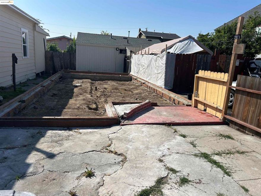 Land use is 2 houses on 1 lot.  Front house was torn down due to condition.  Buyer must rebuild. Permit and drawings are 85% complete.  Back house is 2/2 built about 1980 but has new kitchen and sewer lateral