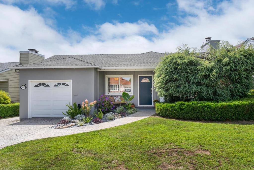 Nestled in Mills Park, one of San Bruno's most desirable areas, this classic ranch-style residence is a rare opportunity. Lovingly cared for by the owners for over 5 decades, it welcomes you with warmth and invites you to make it your own. Recently updated with refinished hardwood floors and fresh, soothing neutral paint, this home is a perfect backdrop for any decor. Generous windows and skylights bring in natural light and connect you with the outdoors. Inviting living room with fireplace and private wooded view. Kitchen with updated quartz countertops, seamlessly connected to dining area. Spacious primary bedroom with en-suite. Guest bedroom with wall to wall closets.Two full baths, including walk-in shower. Bonus room (office, gym, sunroom) with calming hill views. Large deck and low-maintenance backyard, perfect for morning coffee or weekend entertaining. Sound insulated windows and front door. This timeless home is in a prime location with unbeatable convenience. Quick access to I-280, US 101, BART, restaurants, shopping and parks. You Tube and Walmart HQ's are less than a mile away. Location, light, lifestyle...it's all here. More than a home---it's an invitation to comfort, convenience and possibility.