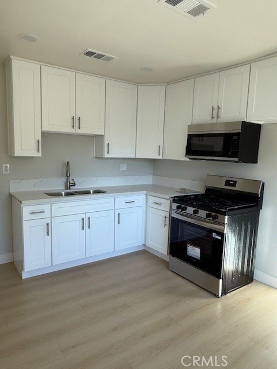 fully remodelled 2 bed 1 bath unit with new kitchen and bathroom celling fans throughout the house there is a small back yard for your needs there is a shot for the laundry washer.  located in a quiet neighbourhood ready to move in.